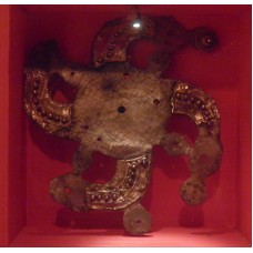 Silver buckle, rounded swastika 